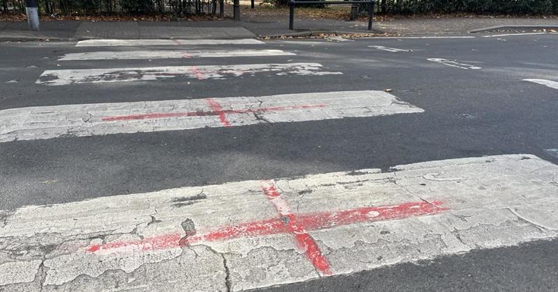 More flags appear painted on city crossing as locals urge clampdown