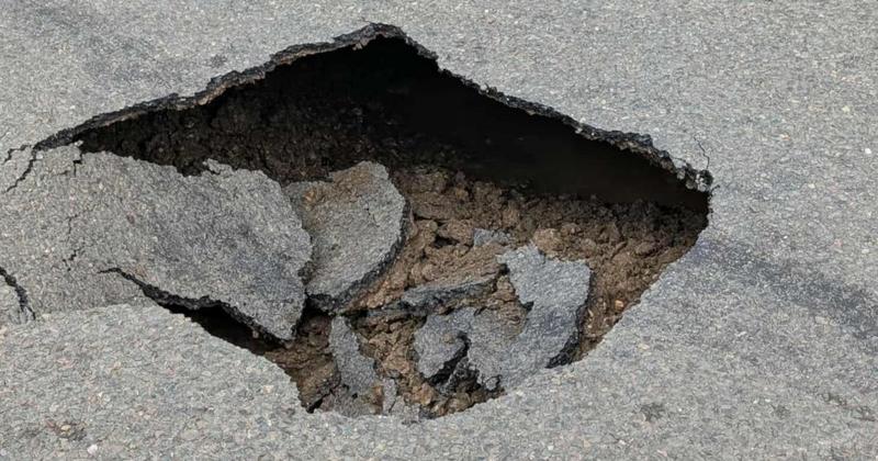 Village road closed after sinkhole appears