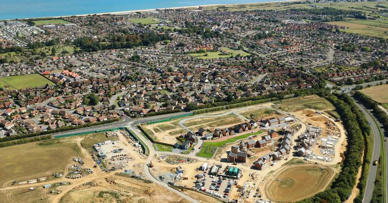 Aerial photo shows work at controversial 665-home development on coast