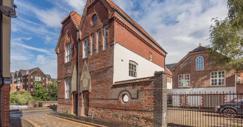 Riverside townhouse with period character for sale at £450k