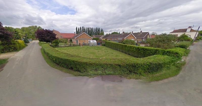 Plans revealed for small new home on village garden