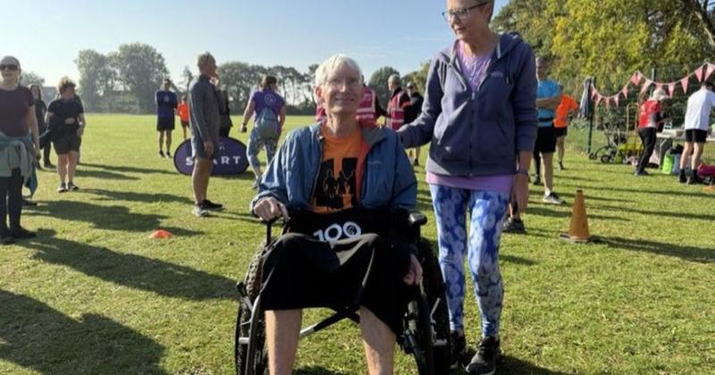 Loud cheers as parkrun stalwart diagnosed with MND completes 100th event