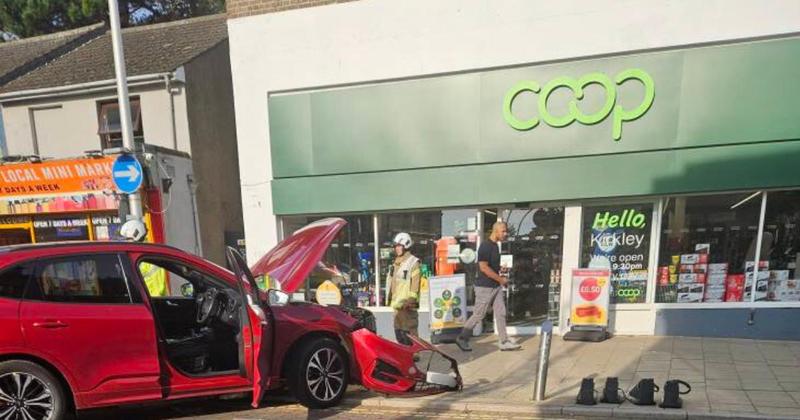 Roads closed after car crashes outside Co-op store