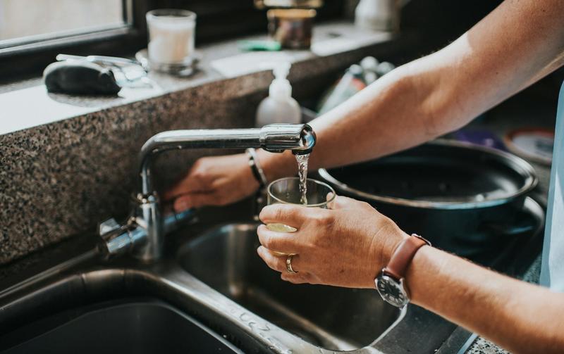 Some towns are cutting fluoride from water supplies. Here’s what this means for locals’ teeth