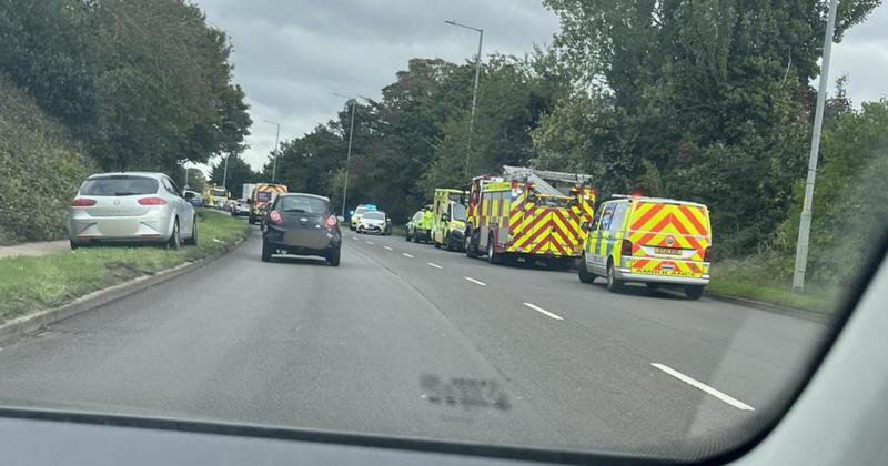 Person taken to hospital after car crashes into hedge