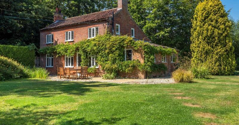 Detached riverside cottage in Irstead for sale at offers over £650,000