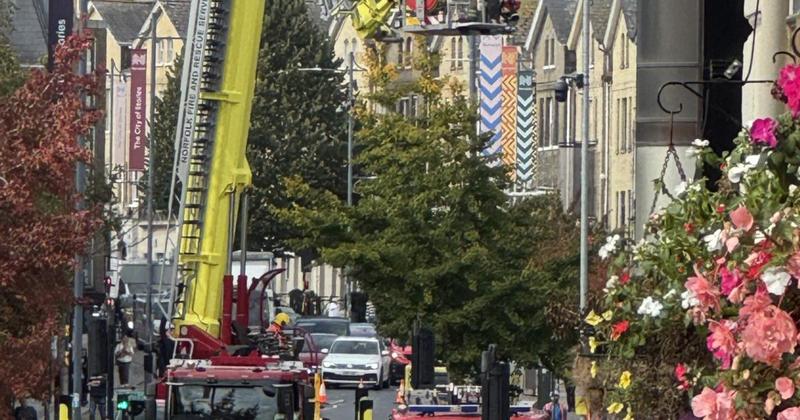 Fire crews close major road as aerial ladder platform used