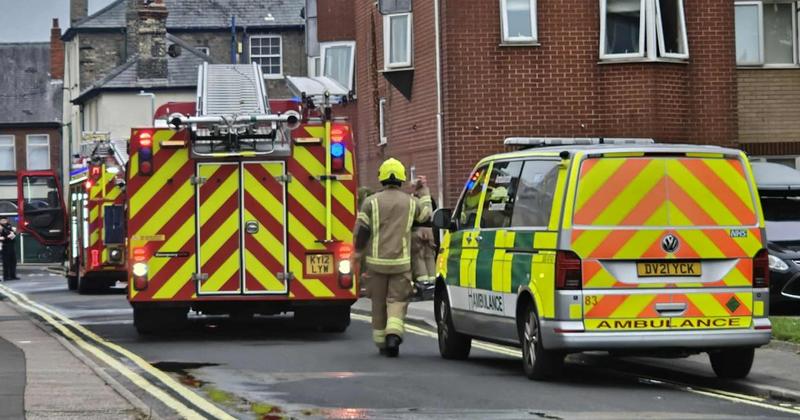 Emergency services fill quiet road after incident in seaside town