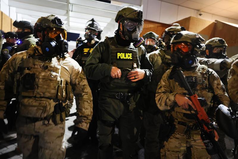 ICE Agent Threatens to Shoot Ambulance Driver Helping Protester