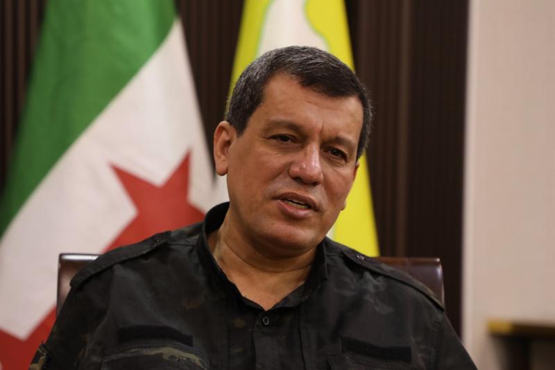 Commander of Kurdish-led Syrian militia says deal reached to merge into national army