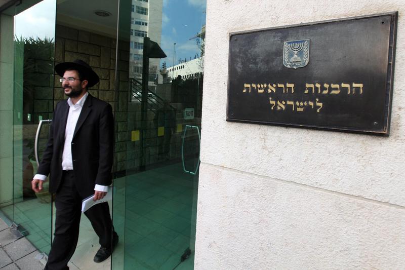 Coalition advances bill mandating mezuzahs, allowing Orthodox rituals in public spaces