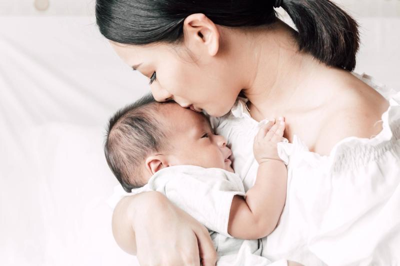 Can the world handle having fewer moms?