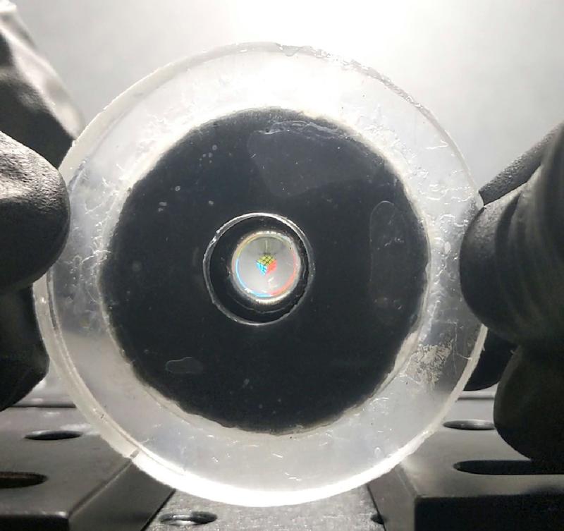 A flexible lens controlled by light-activated artificial muscles promises to let soft machines see