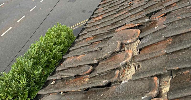 Tornado rips hole in roof after hitting Norfolk town Tornado rips hole in roof after hitting Norfolk town