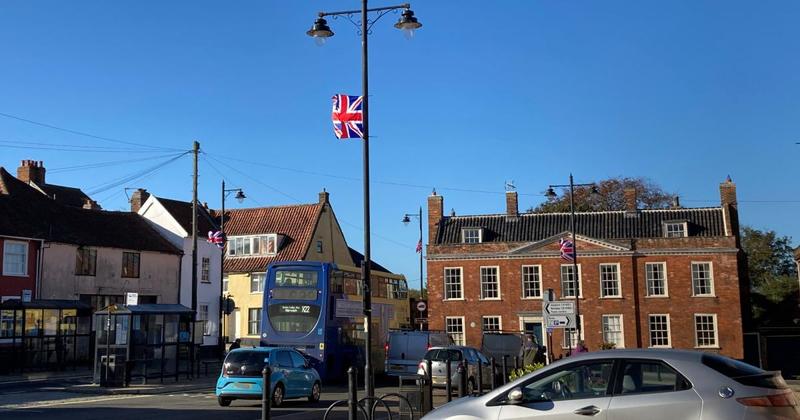 Row erupts outside pub as flags put up in market town Row erupts outside pub as flags put up in market town