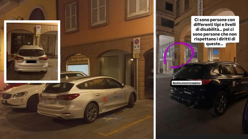 Cestisti biancorossi e le auto in sosta negli stalli dei disabili