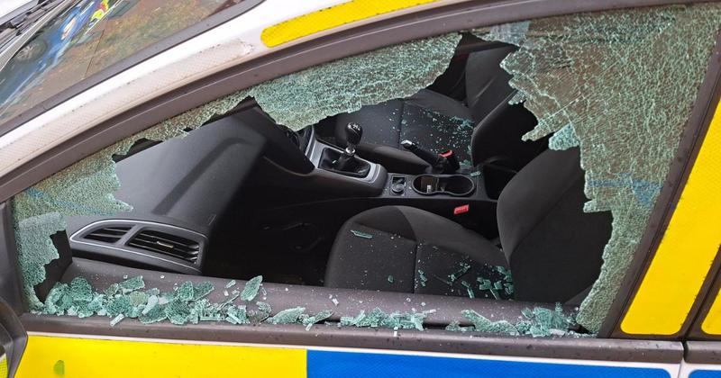 Man smashes police car window outside station...and then hands himself in