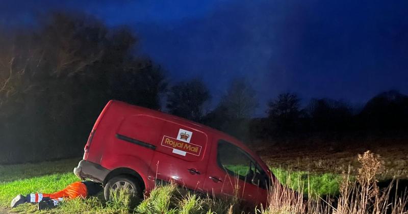 Post Office van crashes into a ditch forcing a road closure
