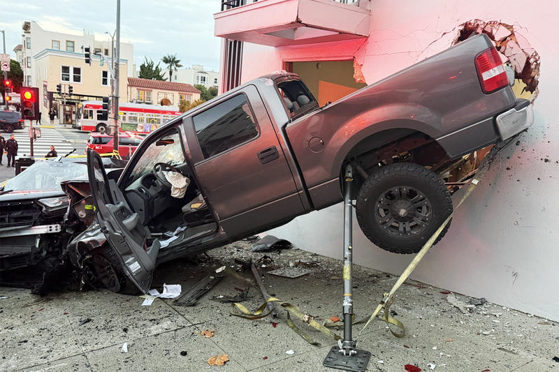High-speed crash lodges truck in wall of SF hotel, leaves two injured