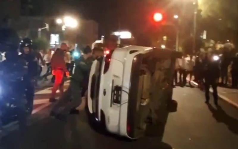 Two arrested after ultra-Orthodox protesters overturn Military Police car in Ramat Gan Two arrested after ultra-Orthodox protesters overturn Military Police car in Ramat Gan