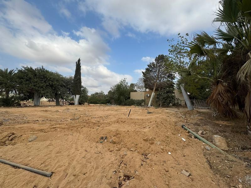 Tiny Kibbutz Holit, a desert oasis gutted on Oct. 7, competes for attention – and donations
