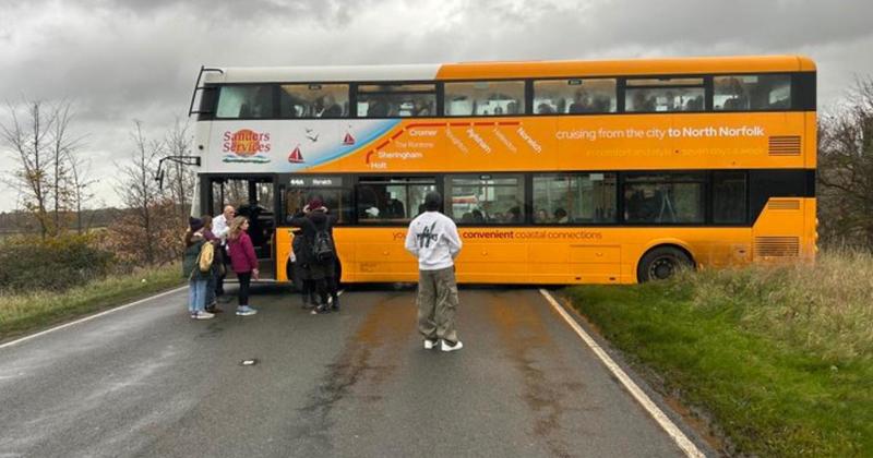 Passengers left stranded after bus gets stuck in ditch trying to avoid road closure