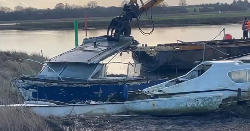 WATCH: Abandoned boats at controversial Broads pub crushed and removed WATCH: Abandoned boats at controversial Broads pub crushed and removed