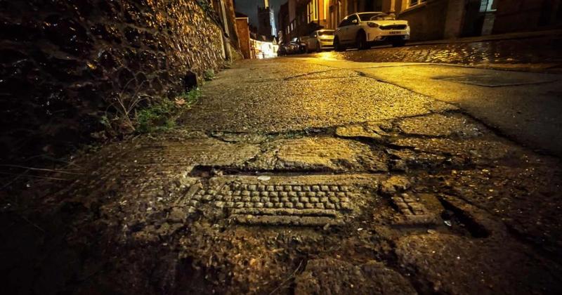 Secret behind strange keyboard imprint in historic street revealed