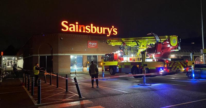 Fire crews attend dangerous sign failure at city supermarket Fire crews attend dangerous sign failure at city supermarket