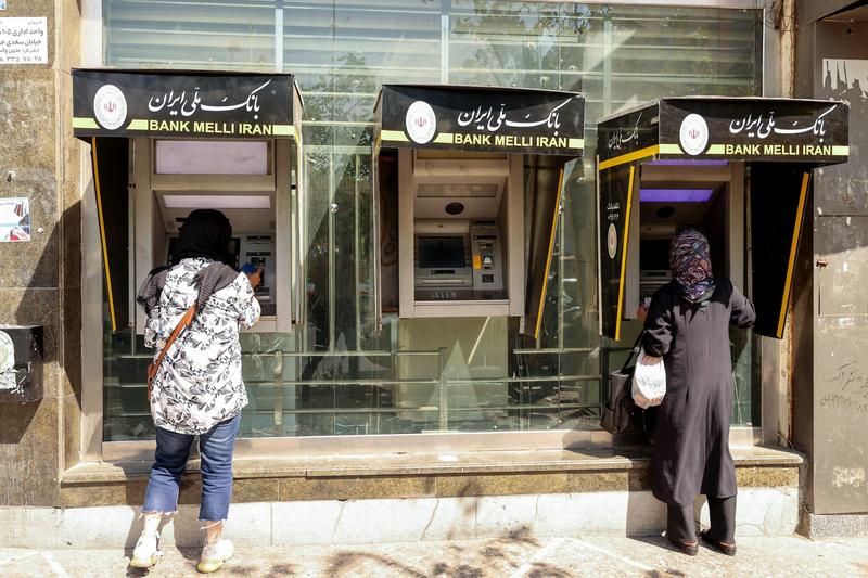 Iran’s currency falls to a new low as nuclear sanctions squeeze its ailing economy