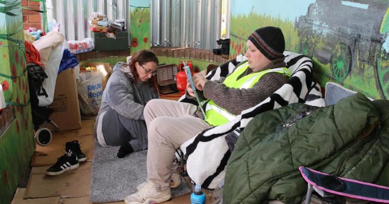 See inside bus shelter as protestors mark day SEVEN in battle to save it