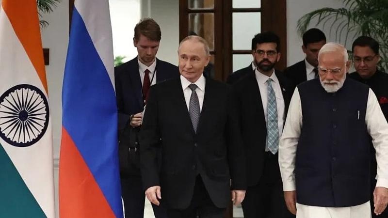 Putin Visit: A Tough Balancing Act Putin Visit: A Tough Balancing Act