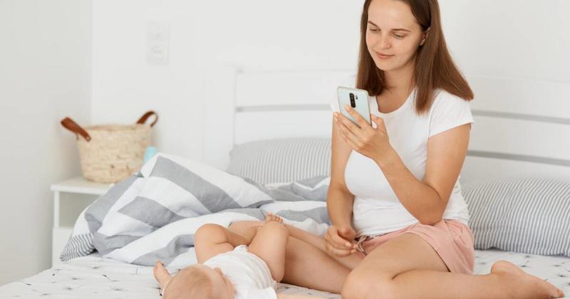Caregiver smartphone use can affect a baby's development. New parents should get more guidance Caregiver smartphone use can affect a baby's development. New parents should get more guidance