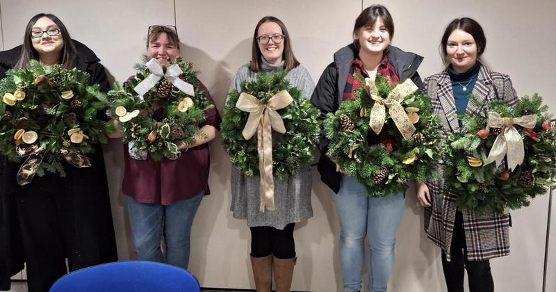 Christmas wreath-making event at charity hospice