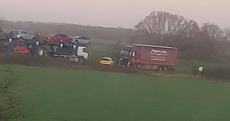 Police shut road after crash involving lorry
