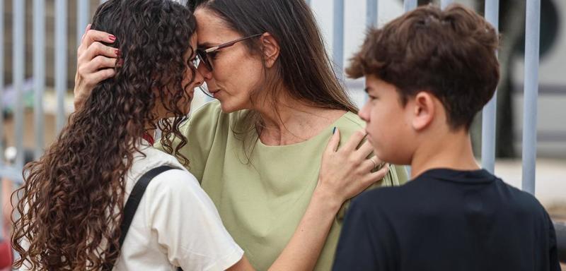 Sob o sol das férias, a sombra do cuidado