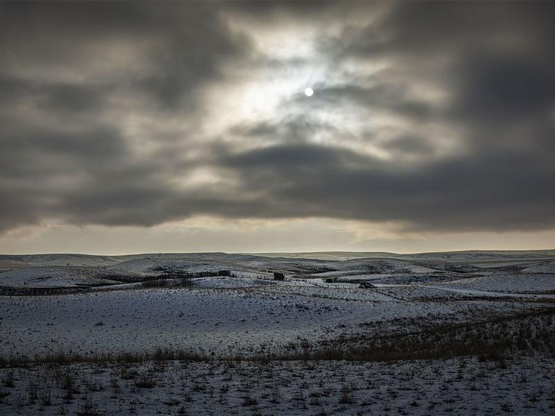 On the Road: Dark clouds, darkening skies