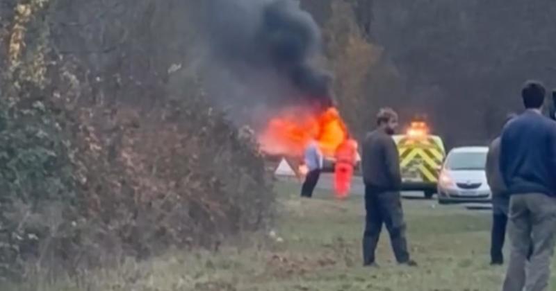 Blazing car on busy road causes 'gridlock' Blazing car on busy road causes 'gridlock'