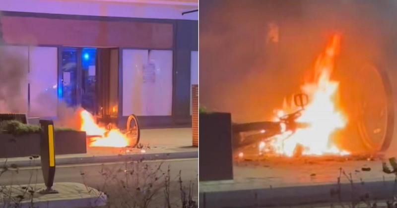 WATCH: Moment bike bursts into flames on busy high street WATCH: Moment bike bursts into flames on busy high street