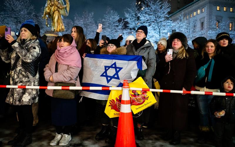 ‘More light’: Crowd at NYC menorah lighting insists on celebration after Sydney massacre