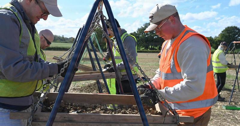 Personnel from US airbase help to recover WWII pilot and plane