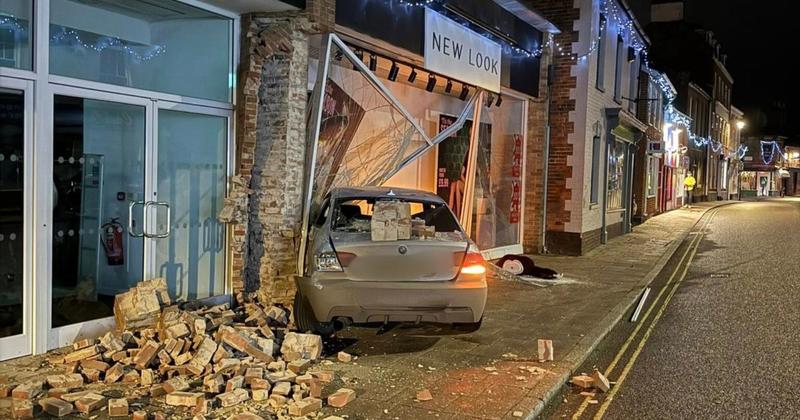 BMW smashes into fashion retailer, hurling half a mannequin into street