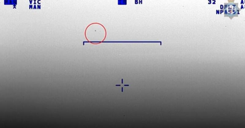 WATCH: Moment F-15 avoids near collision with helicopter searching for drones