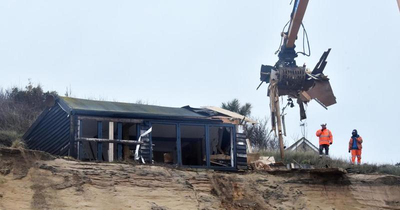 Four homes on crumbling Norfolk coast demolished before they fall into the sea