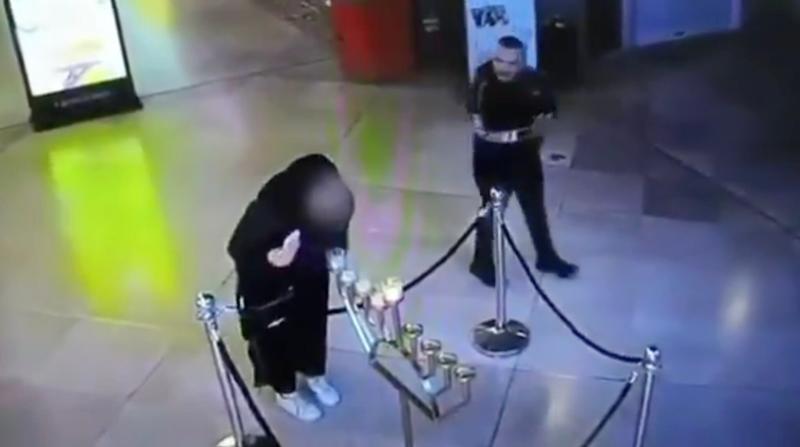 Police open investigation after woman blows out Hanukkah candles in Tel Aviv mall