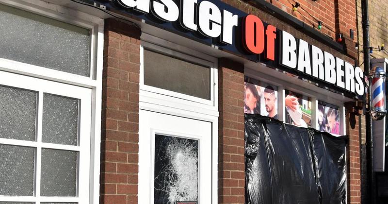 Police continue hunt for gang who smashed up barbershop with baseball bats