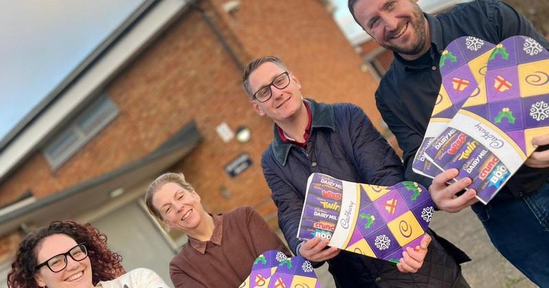 Norfolk firm donates selection boxes to every child at city school