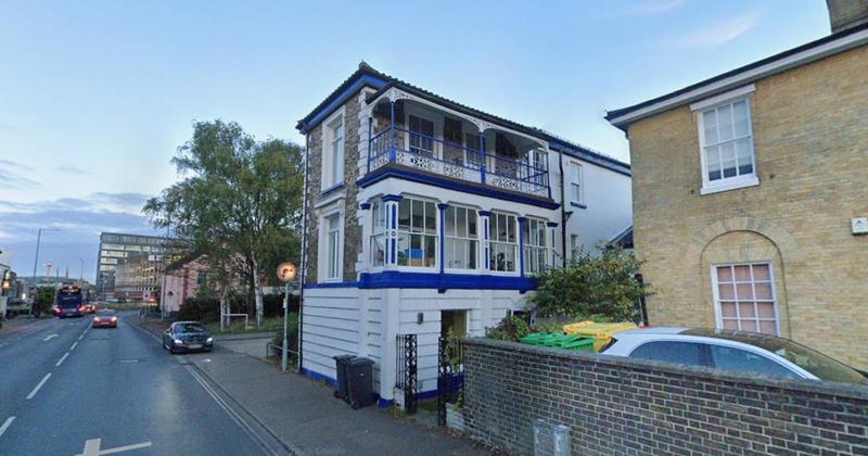 Officials say huge advert on the side of a distinctive building must come down Officials say huge advert on the side of a distinctive building must come down