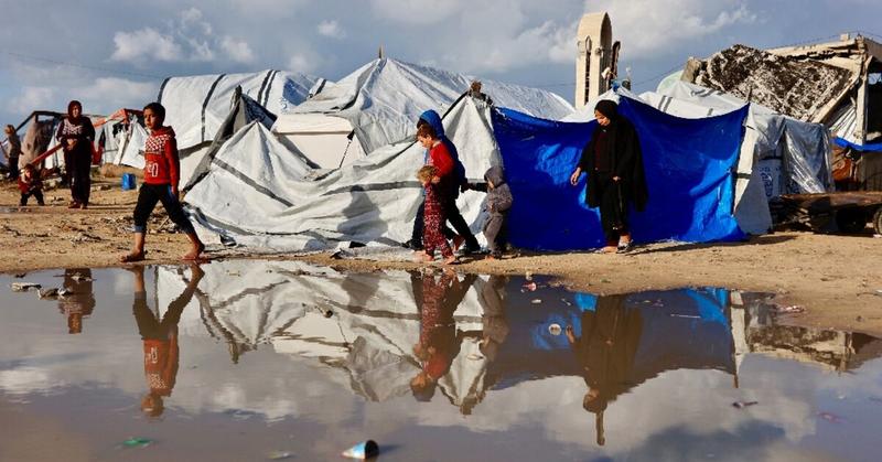 'Shivering from cold and fear': winter rains batter displaced Gazans