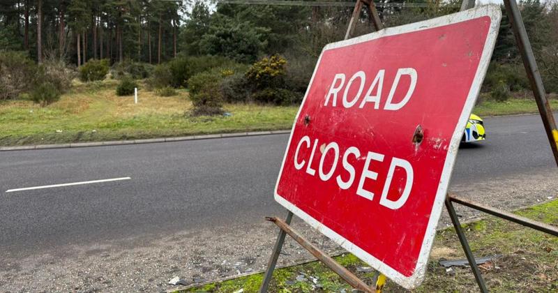 Man with 'handgun' shot dead by police after two-vehicle crash